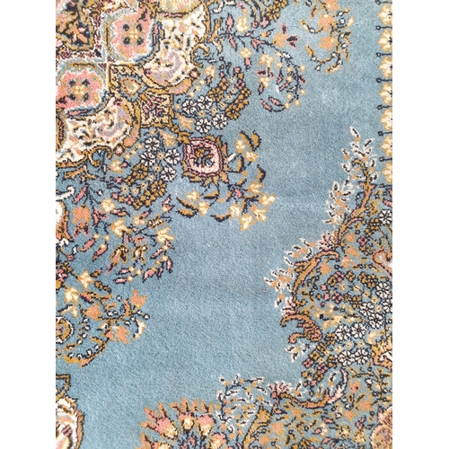 2254 - A blue and pink persian rug 230 x 150cm