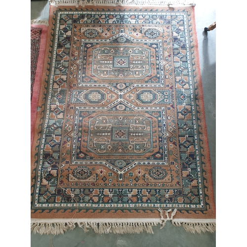 2376 - A Persian green and brown rug 117 x 158cm