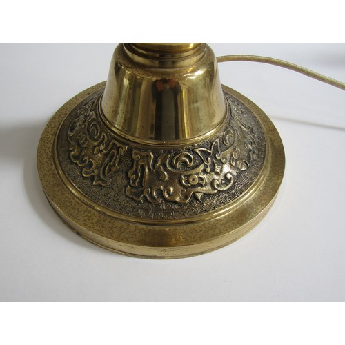 2006 - A 1970's Majesty column telephone in brassed metal with Eastern motifs in relief. 106cm high