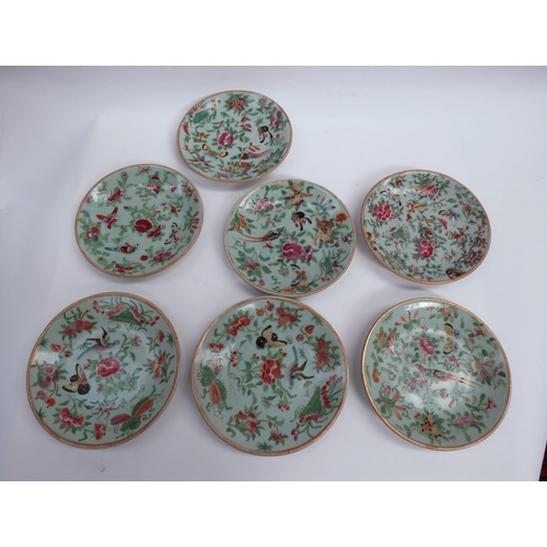 6264 - Eight 19th Century Chinese export celadon green glazed plates of varying size decorated with birds a... 