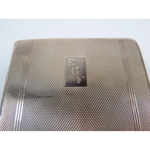 6331 - A silver cigarette case makers mark G F B, monogrammed E G F, London 1945. 188g