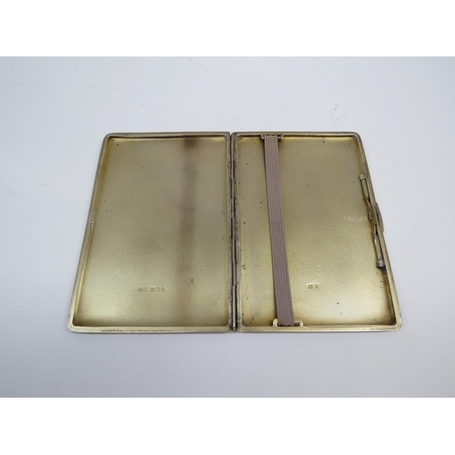 6331 - A silver cigarette case makers mark G F B, monogrammed E G F, London 1945. 188g