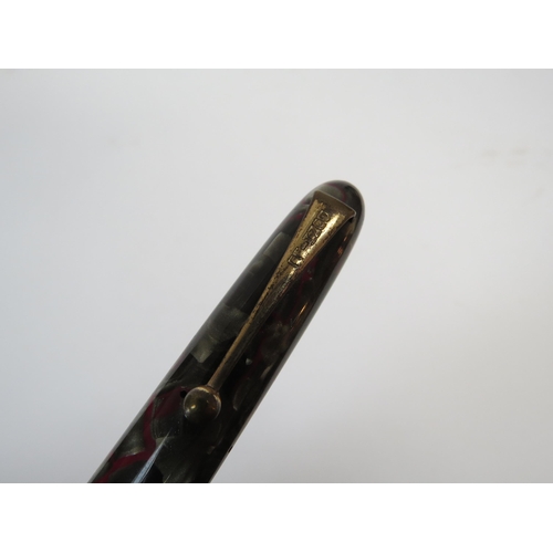 6332 - A Dunhill Namiki 18ct gold nibbed No 6 fountain pen in mottled case, 14cm long