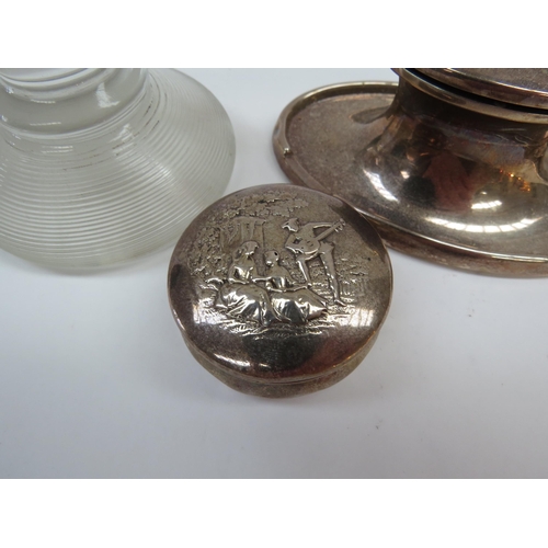 6333 - Silver capstan, match striker and pot (3)