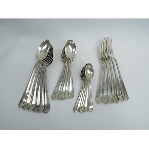 6350 - A set of Walker and Hall silver cutlery consisting of six soup spoons, six dessert spoons, six teasp... 