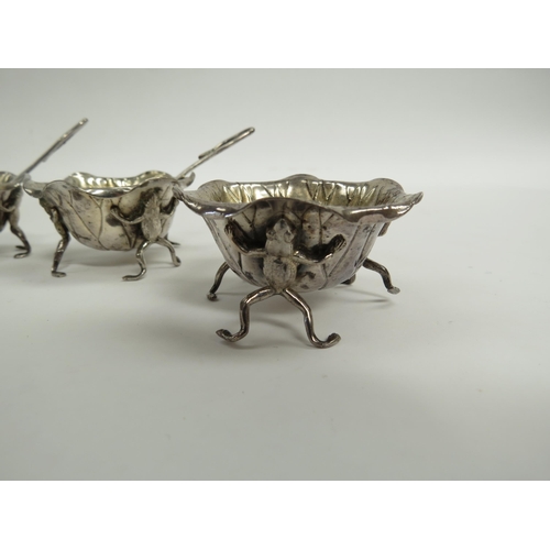 6352 - A set of four silver salts as frogs (one has a leg missing) holding lily pads aloft, maker AW, Birmi... 