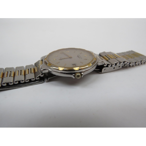 6366 - A Longines Conquest wristwatch, quartz movement, bi-metal strap and case, 31mm diameter