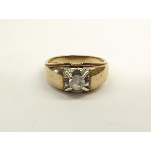 6390 - A 9ct gold ring set with central diamond 0.05ct approx, 5.4g