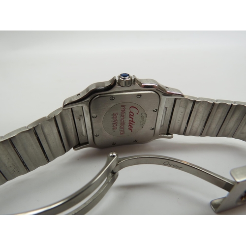 6408 - A Cartier Santos Galbée bi-metal wristwatch, silvered dial with Roman numeral markers and blued hand... 