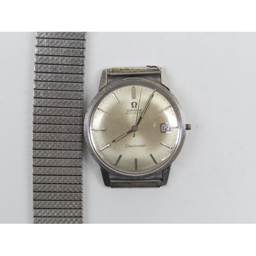 6412 - An Omega Automatic Seamaster wristwatch with baton markers and date aperture, no crown to winder, st... 