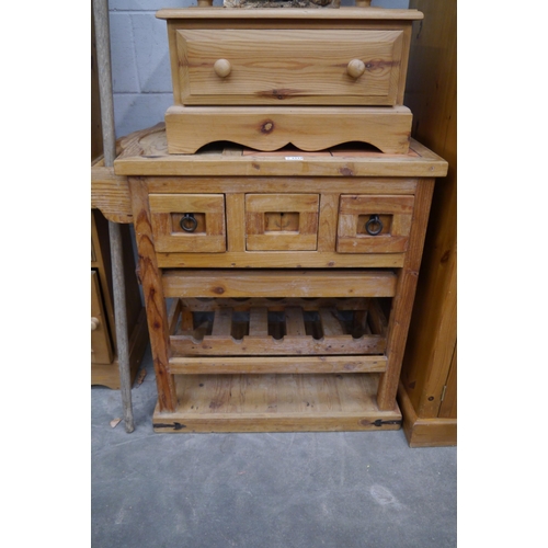 2308 - A pine kitchen counter, tiled top with wine rack