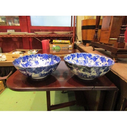 4004 - Two 20th Century Chinese blue and white scalloped-edge bowls with figural and floral design, both ap... 