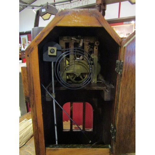 4010 - An early 20th Century oak cased mantel clock, 15