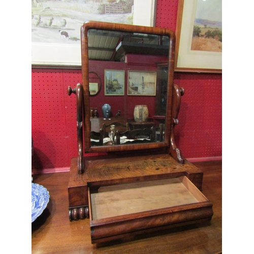 4025 - A mid-Victorian mahogany dressing chest tilting mirror on carved 