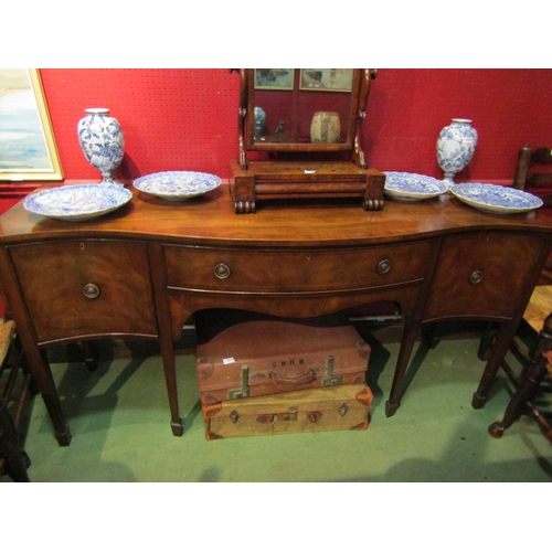 4028 - An Arthur Brett reproduction mahogany sideboard, serpentine front with single drawer flanked by cupb... 