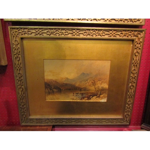 4044 - CORNELIUS PEARSON (1805-1891): A watercolour of mountain valley with cattle in lake, some discoloura... 