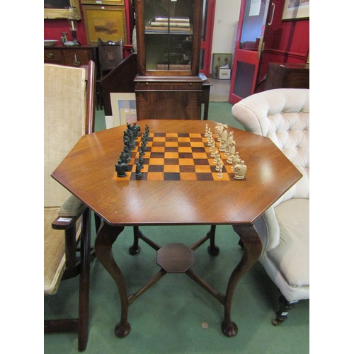 4071 - An octagonal-top chess table on cabriole legs with pieces, three pieces a/f