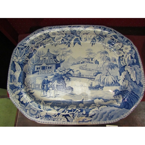 4076 - A Victorian Davenport blue and white meat plate with Oriental scene, 48cm long