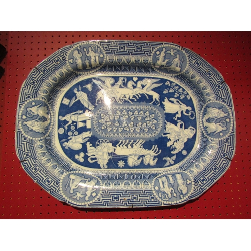 4079 - A 19th Century blue and white meat plate with Grecian scenes, 54cm long