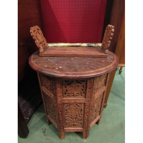 4095 - An Indian brass inlaid occasional table with folding base (some brass inlay missing), a book stand a... 