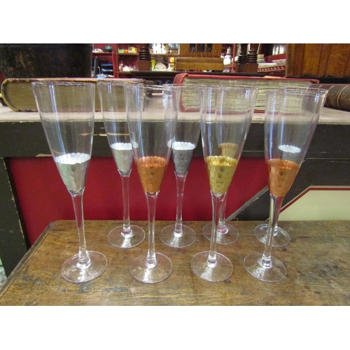 4106 - A set of eight Oliver Bonas champagne flutes