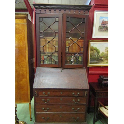 4108 - A 19th Century mahogany bureau bookcase, the astragal glazed top over a fall front opening to reveal... 