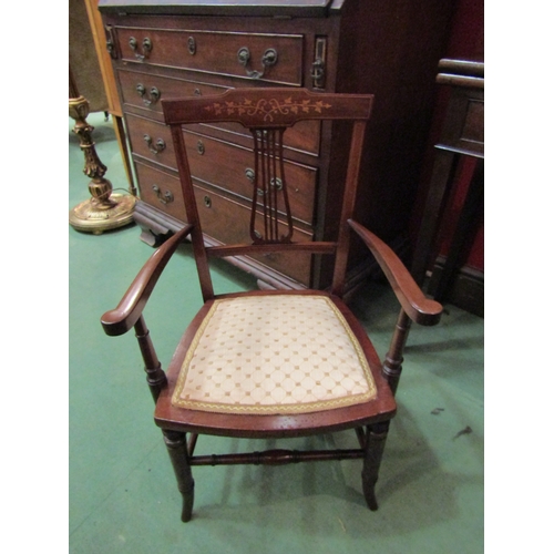 4117 - An Edwardian inlaid mahogany child's open armchair, the fretwork lyre central splat and outwept scro... 