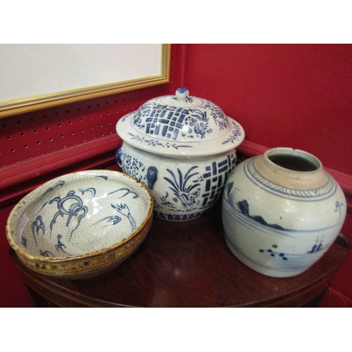 4118 - A crackle-glazed hand-thrown bowl, blue dragon and lunar detail on white ground. A Chinese export ha... 