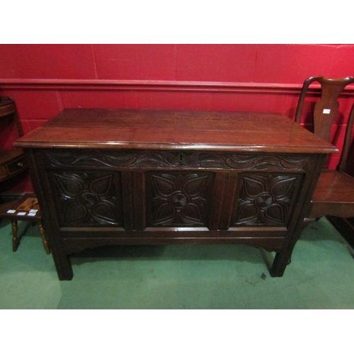 4122 - A circa 1780 pegged joined oak coffer, the split ring hinged top with internal candle/taper box over... 