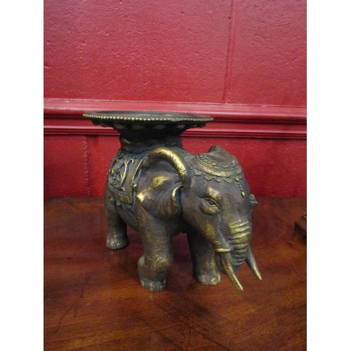 4153 - A candle stand as an elephant, 16cm tall