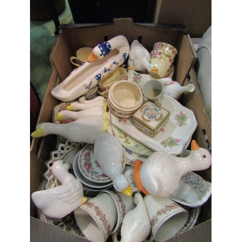 4176 - Two boxes of assorted ceramic kitchenware, dinner wares and figures etc. including novelty teapots