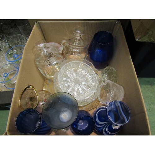 4185 - Four boxes of various glassware, mainly drinking glasses, bowls and vases. Together with a wooden bi... 