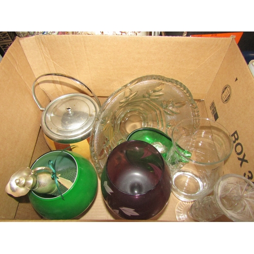 4185 - Four boxes of various glassware, mainly drinking glasses, bowls and vases. Together with a wooden bi... 