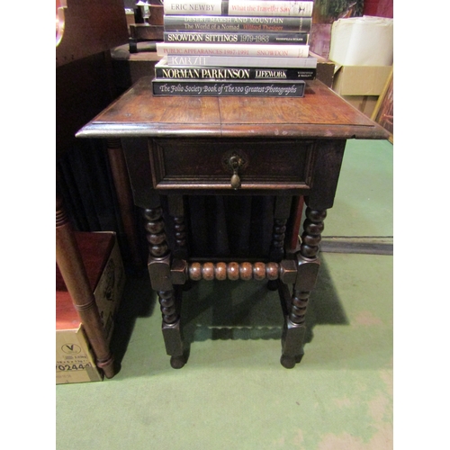 4207 - A 19th Century lamp/hall table, the single frieze drawer over turned bobbin/square legs united by st... 