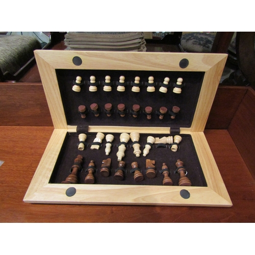 4208 - A folding wooden chess set with wooden pieces