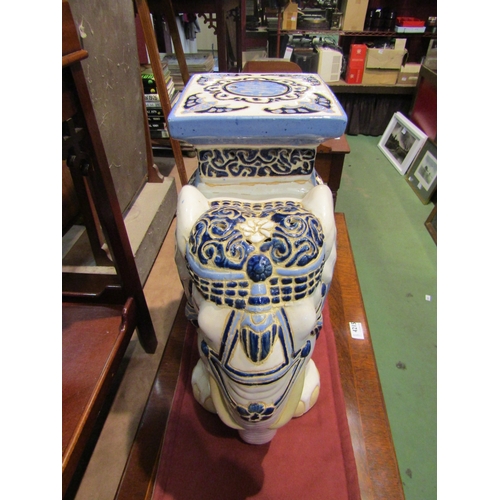 4214 - A ceramic elephant jardiniere stand, 42cm tall