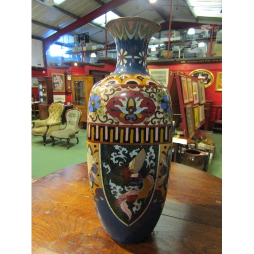 4221 - A Japanese cloisonne vase, design of dragons and foliage, some minor damage, 34.5cm high