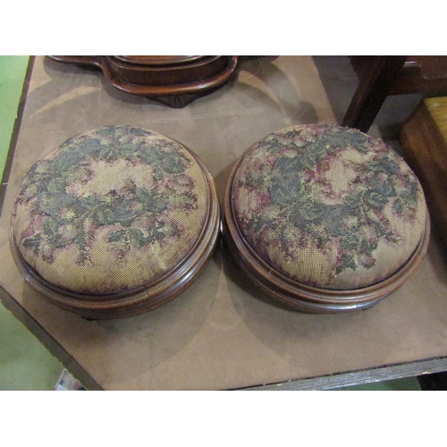 4242 - A pair of mid-19th Century circular footstools in inlaid walnut, beadwork covering on black porcelai... 