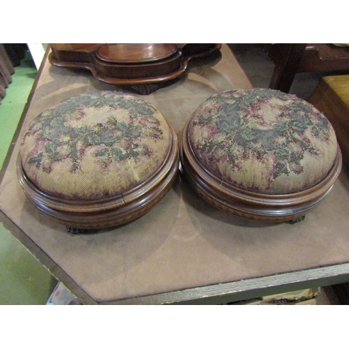 4242 - A pair of mid-19th Century circular footstools in inlaid walnut, beadwork covering on black porcelai... 