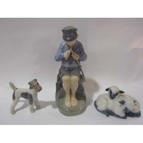 4287 - Three Royal Copenhagen figures, boy whittling, 18cm tall, a terrier, and sleeping sheep