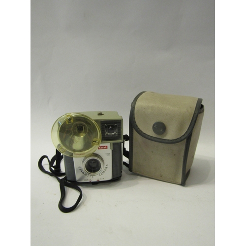 4293 - A pair of Denhill France 8x25 binoculars in leather case, a pair of Pathescope 20x50 binoculars, cas... 