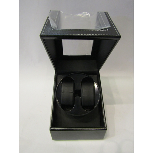 4305 - A boxed unused leatherette double watch winder