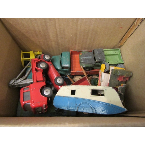 4310 - A collection of vintage Corgi and Dinky Toys vehicles. In played-with condition