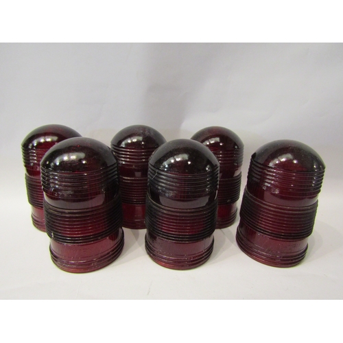 4313 - A set of six red glass runway light covers marked 