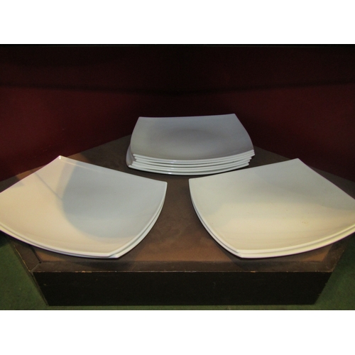 4323 - A set of ten cream glazed serving dishes, 35cm long