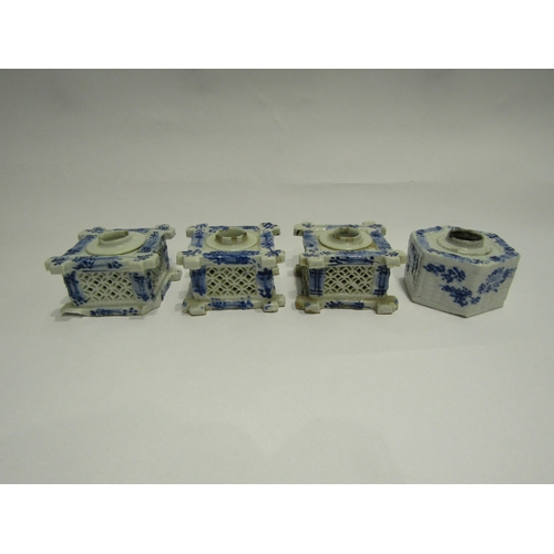 4393 - A group of four blue and white ceramic inkwells, three with lattice-work sides in split bamboo form,... 