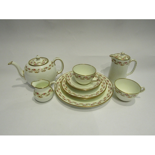 4427 - An Aynsley tea set including teapot, jugs, cups, saucers and plates