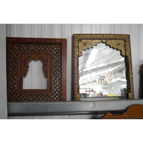 2130 - A brass and wood Indian mirror and another frame