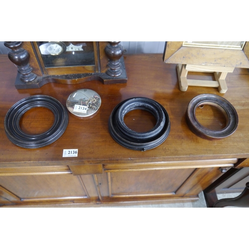 2134 - Four Victorian and later circular frames and Victorian pot lid 