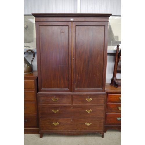 2243 - A 19th Century mahogany linen press on chest